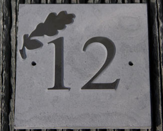 Raised slate house number